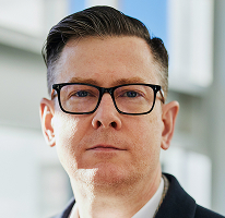 Alexander Hughes CEO portrait of a crypto trading company executive